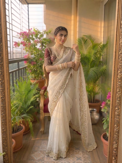 Cream embroidered designer saree