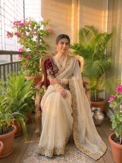 Cream embroidered designer saree