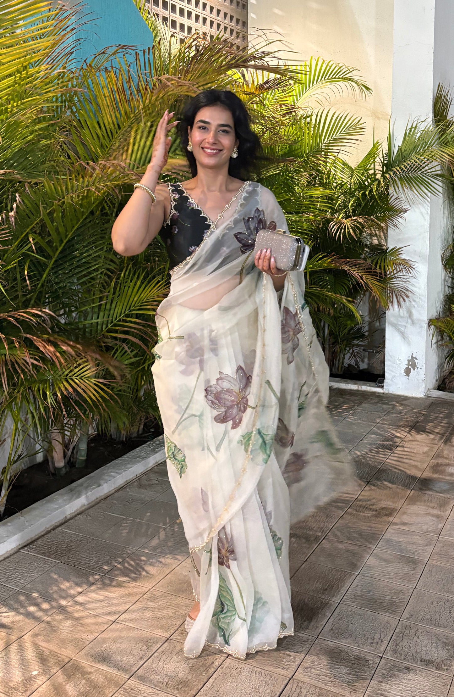 Fancy scalloped lace border design with golden detailing saree