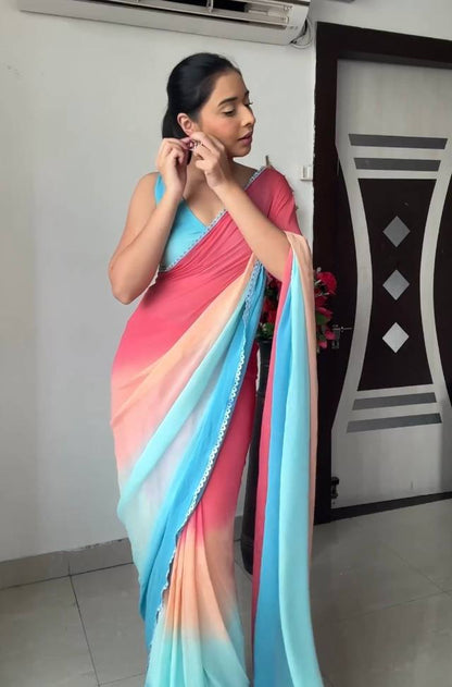 Sky blue & peach gradient georgette saree with golden weaving border