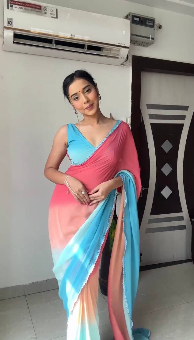 Sky blue & peach gradient georgette saree with golden weaving border