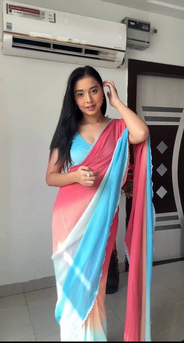 Sky blue & peach gradient georgette saree with golden weaving border