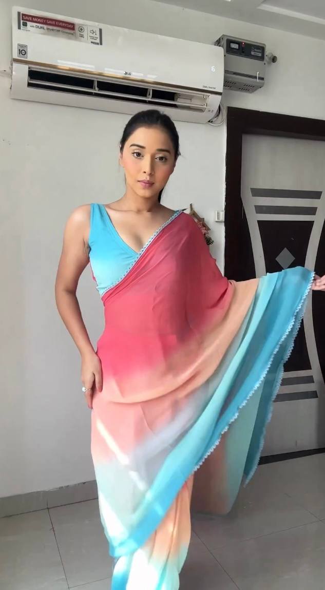 Sky blue & peach gradient georgette saree with golden weaving border
