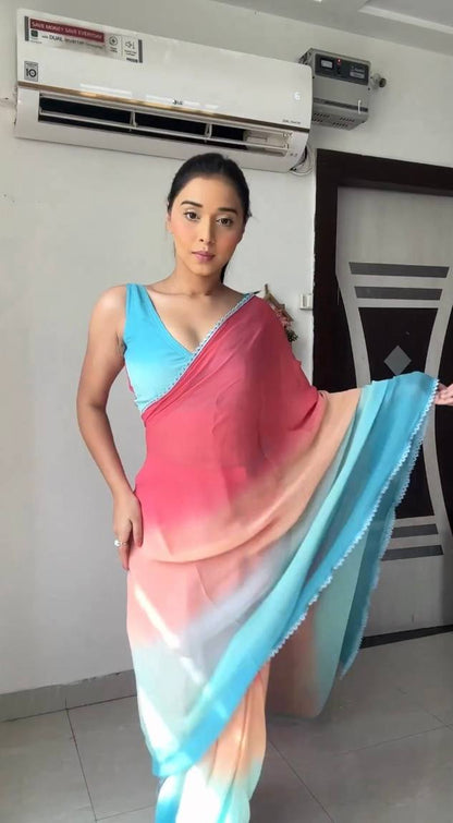 Sky blue & peach gradient georgette saree with golden weaving border